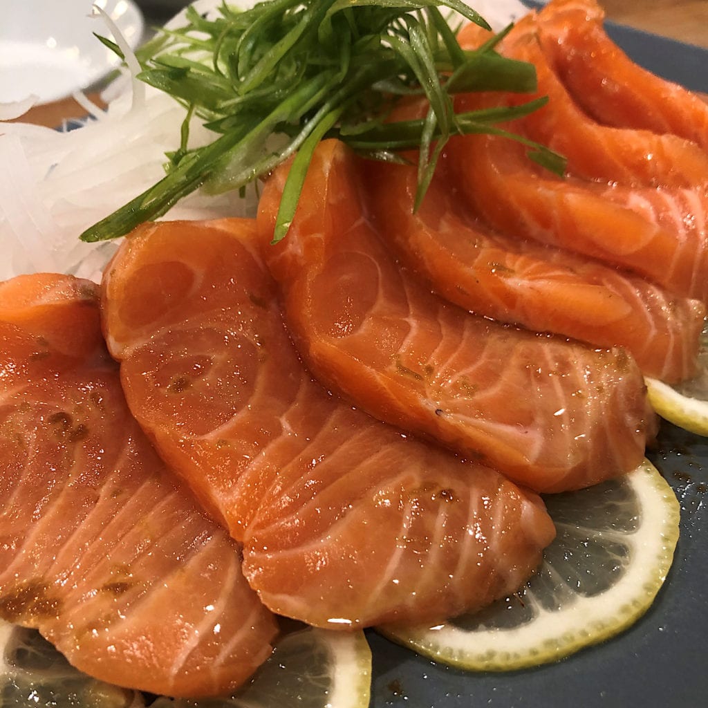 Verlasso salmon with shaved daikon, lemon, and ginger ponzu.